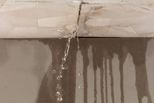 Professional Flood Damage Cleanup technician working in Taftville, CT